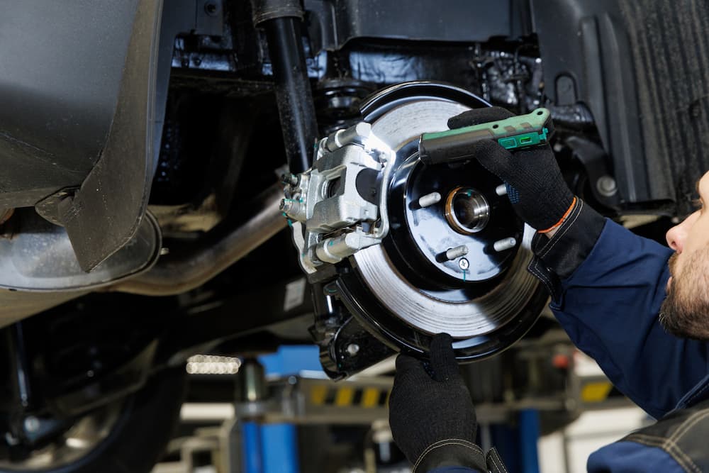 Technician performing brake service