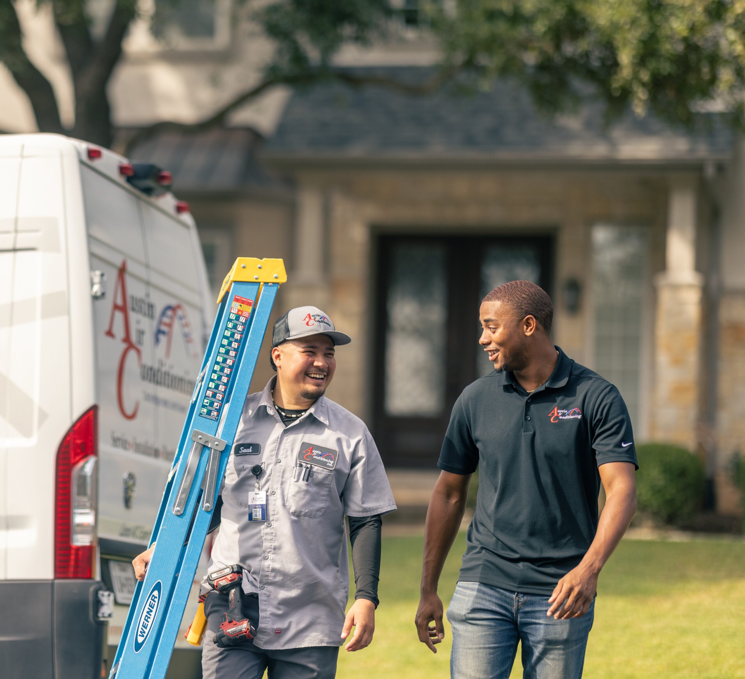 HVAC technicians walking to a job site