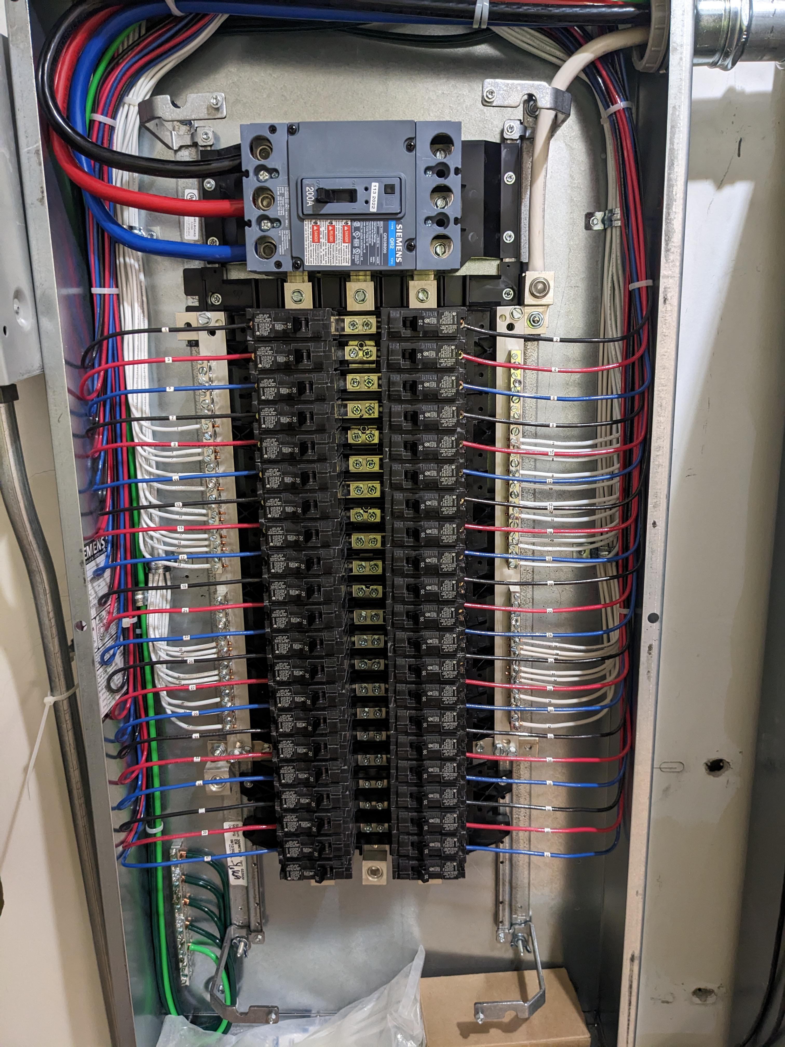 Electrician upgrading a home electrical panel