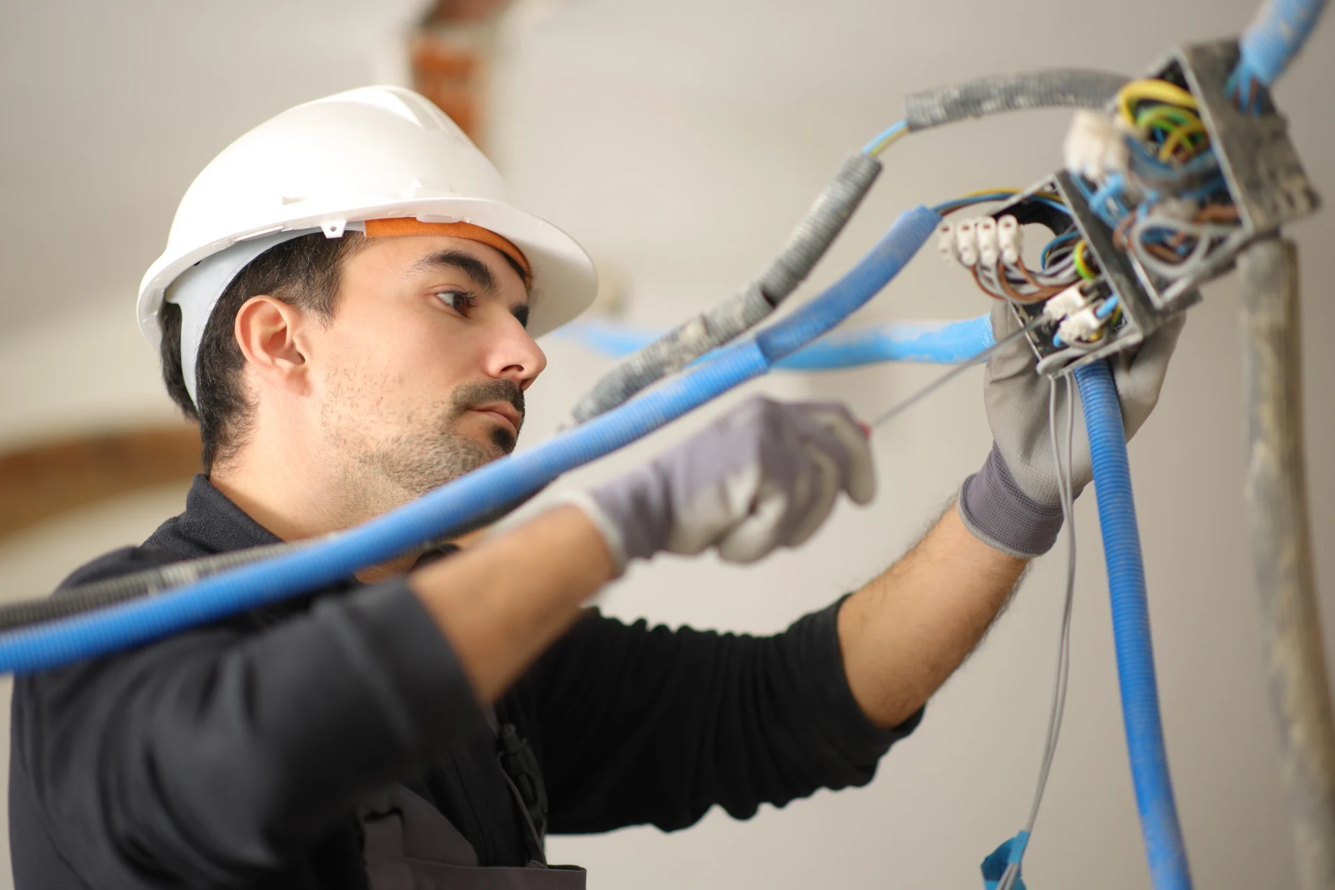 Electrician installing new home wiring